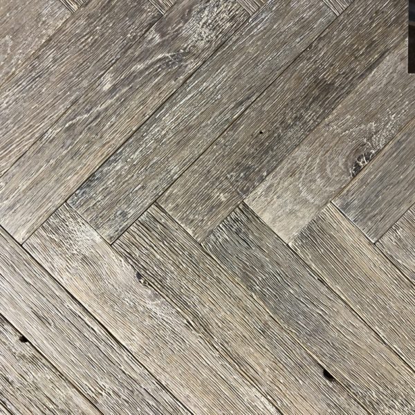 BRUSHED AND LIGHTLY DISTRESSED HERRINGBONE DESIGN